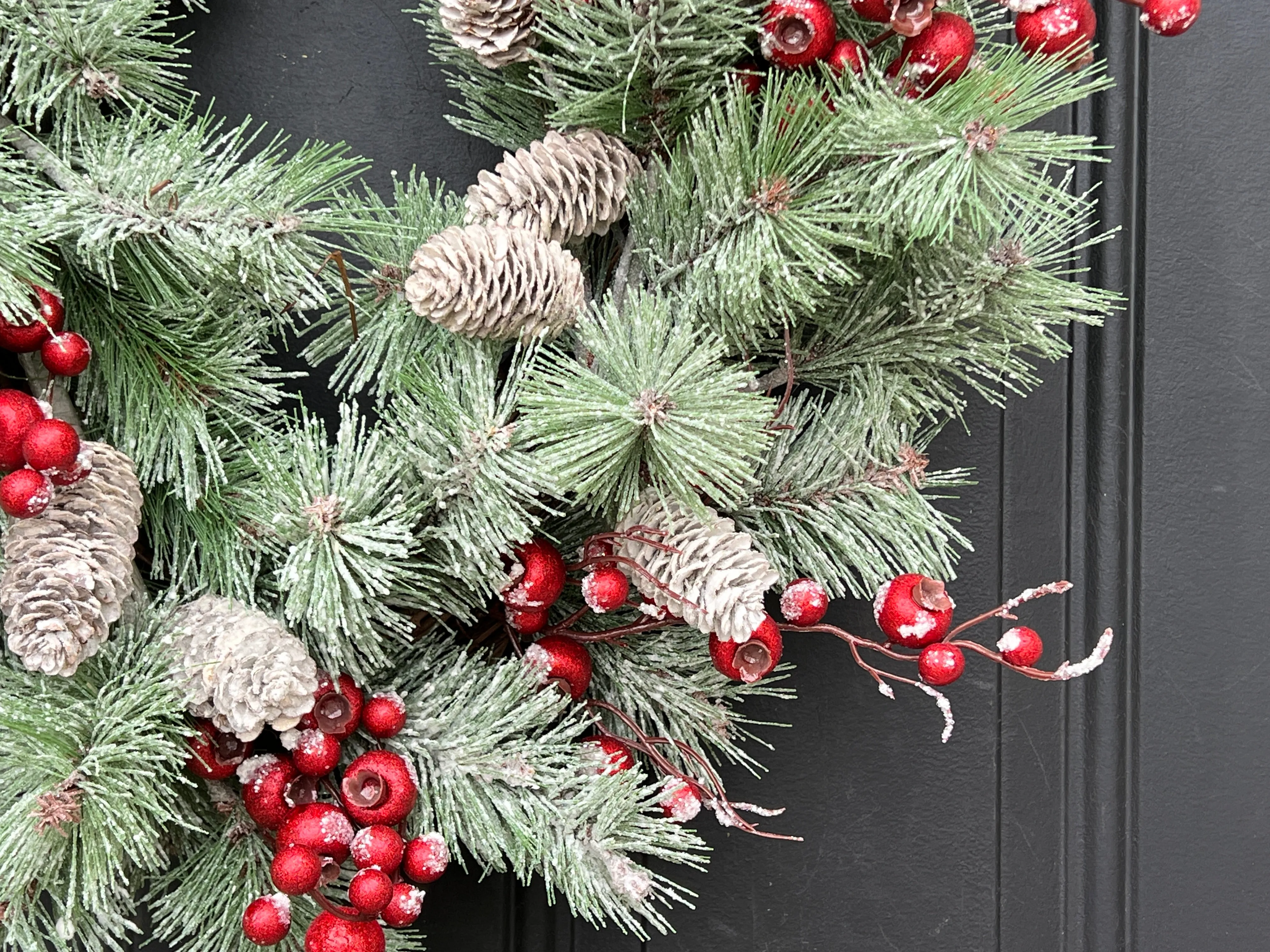 Oval Flocked Winter Pine Wreath with Red Berries and Pinecones