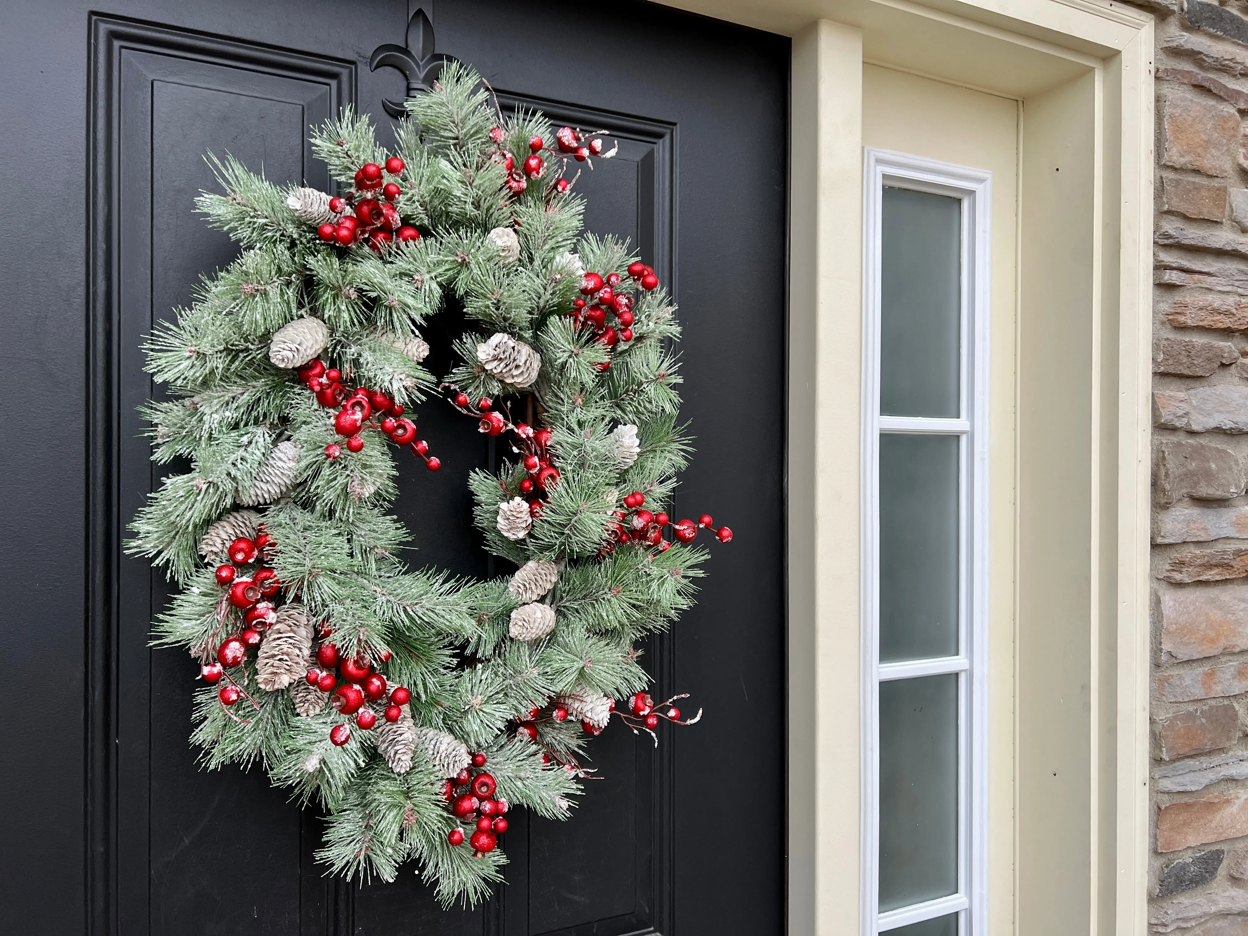 Oval Flocked Winter Pine Wreath with Red Berries and Pinecones